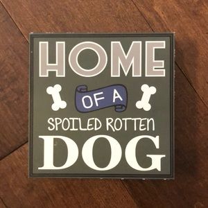 Home of a spoiled rotten dog sign!